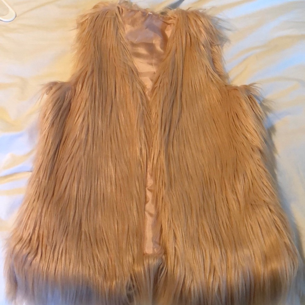 Pink furry vest